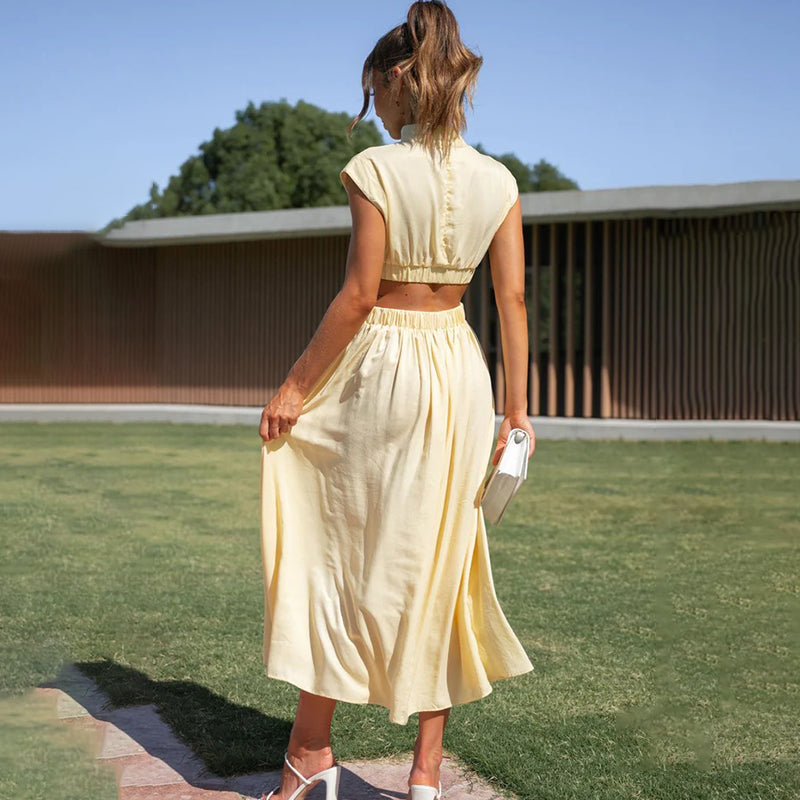 Emilia - Élégante robe à décolleté haut